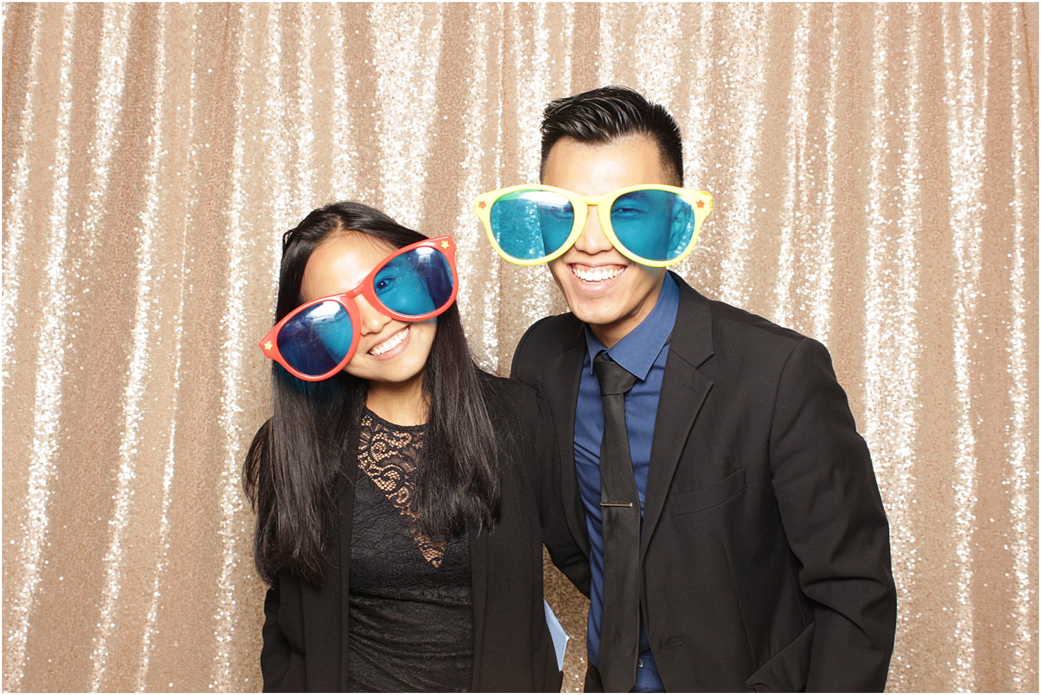 wedding guests pose in sunglasses during NJ wedding reception