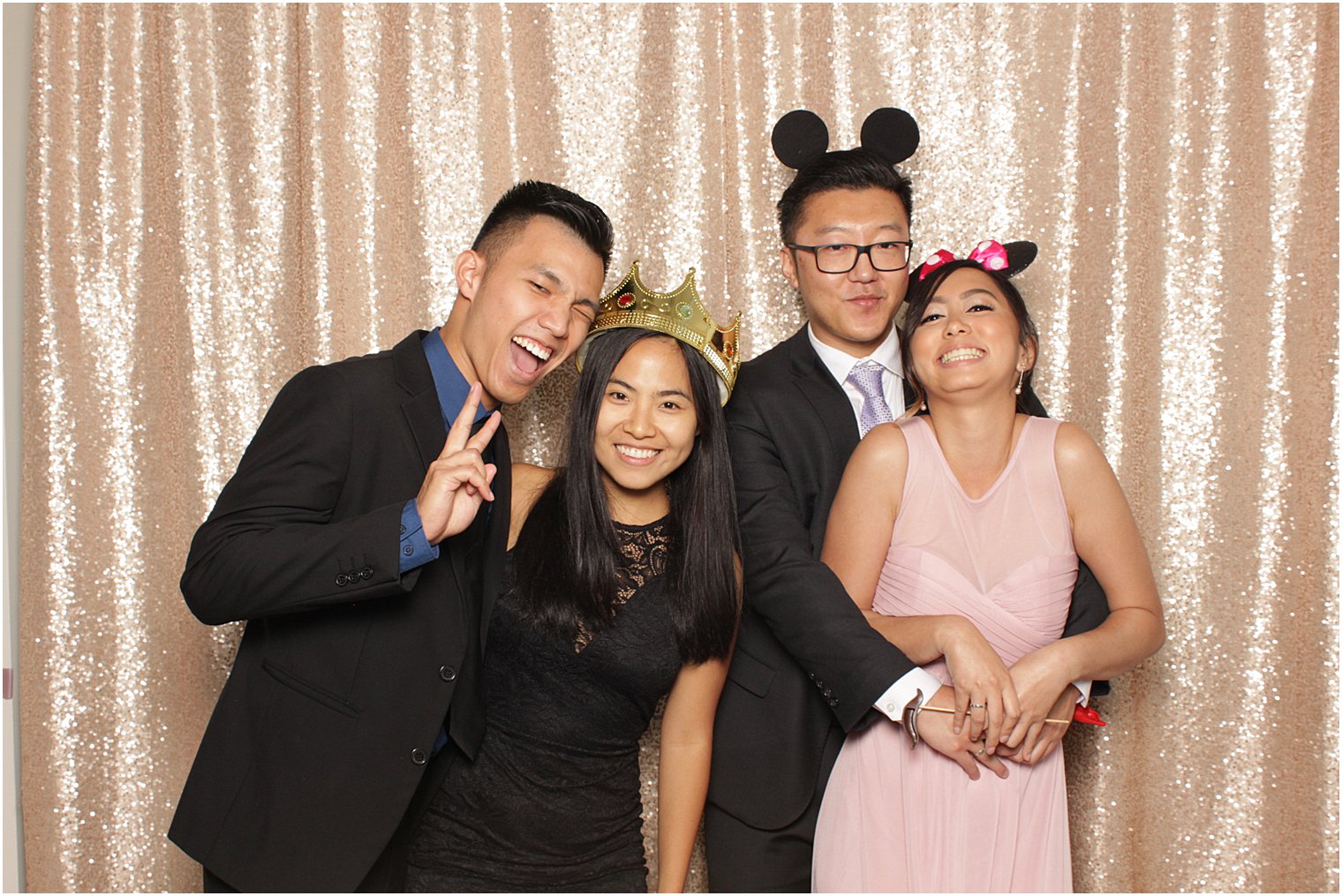 Park Chateau Estate Photo Booth with guests in Mickey ears