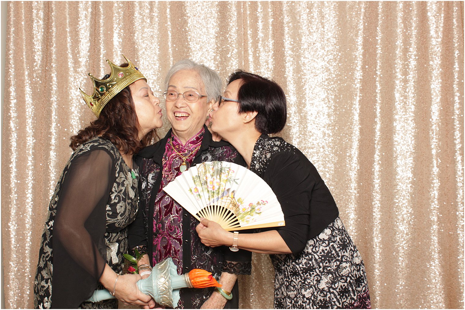 wedding guests pose in Park Chateau Estate Photo Booth