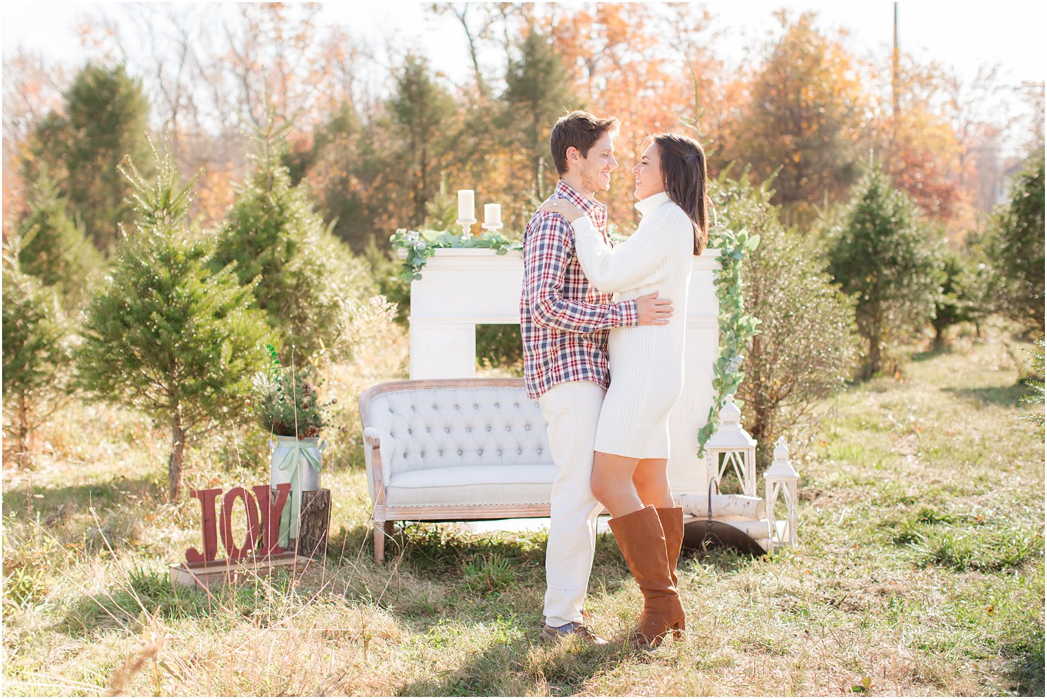 bride and groom pose together in New Jersey during winter engagement session