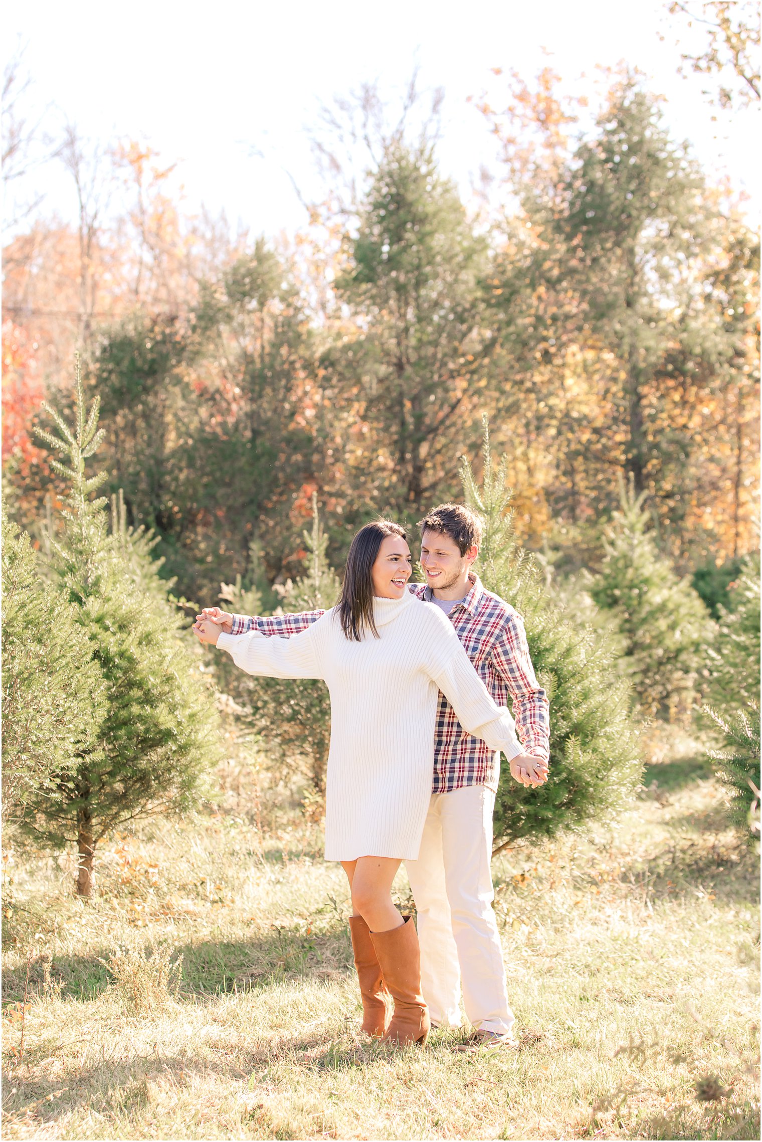 New Jersey engagement portraits by Christmas trees
