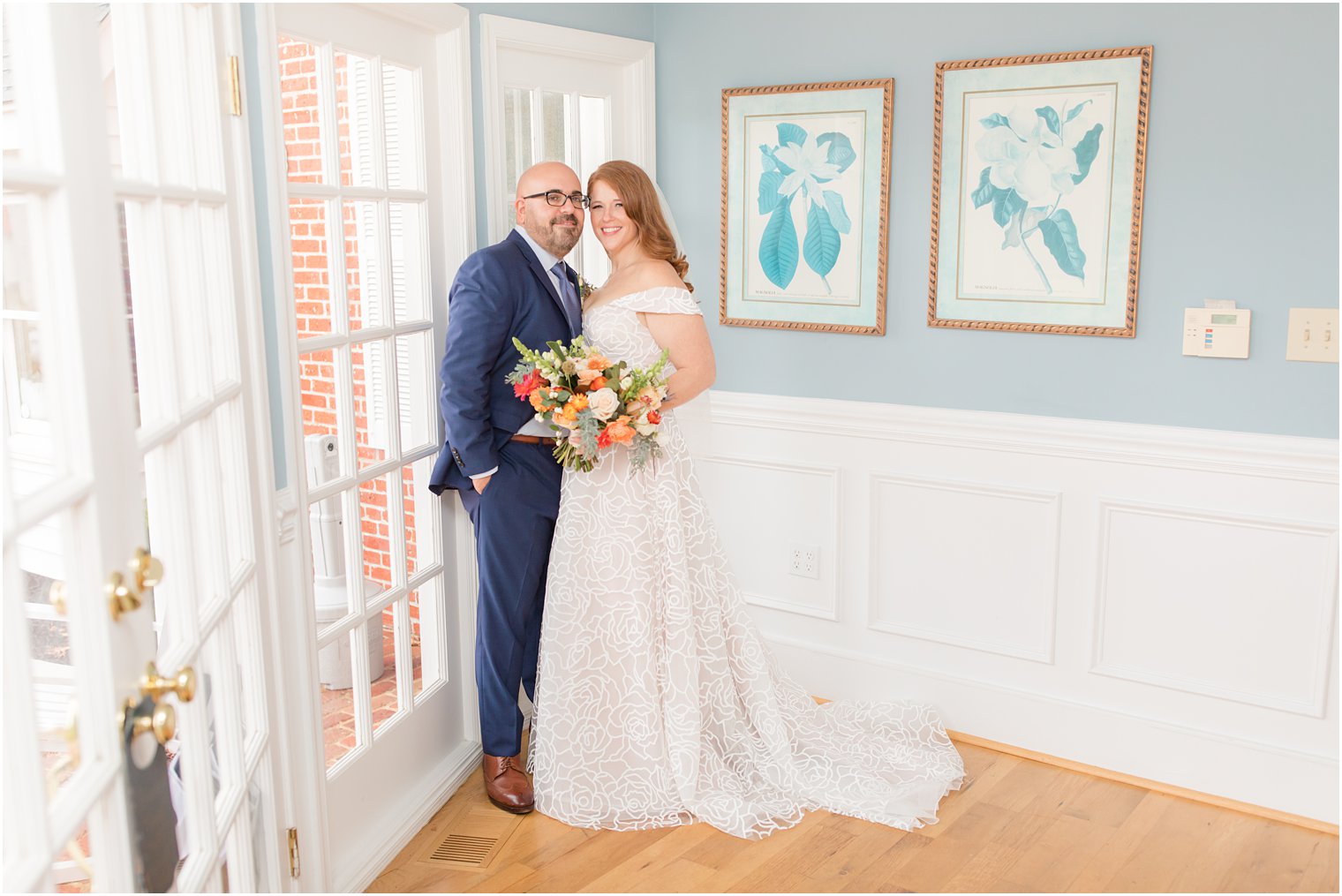 bride and groom pose together in corner of Eagle Manor