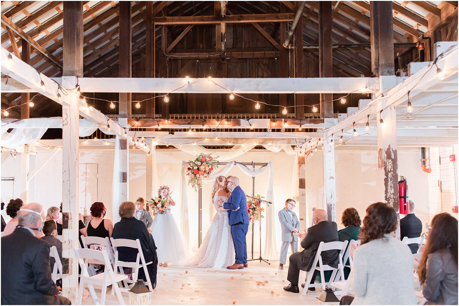 newlyweds kiss after NJ wedding ceremony