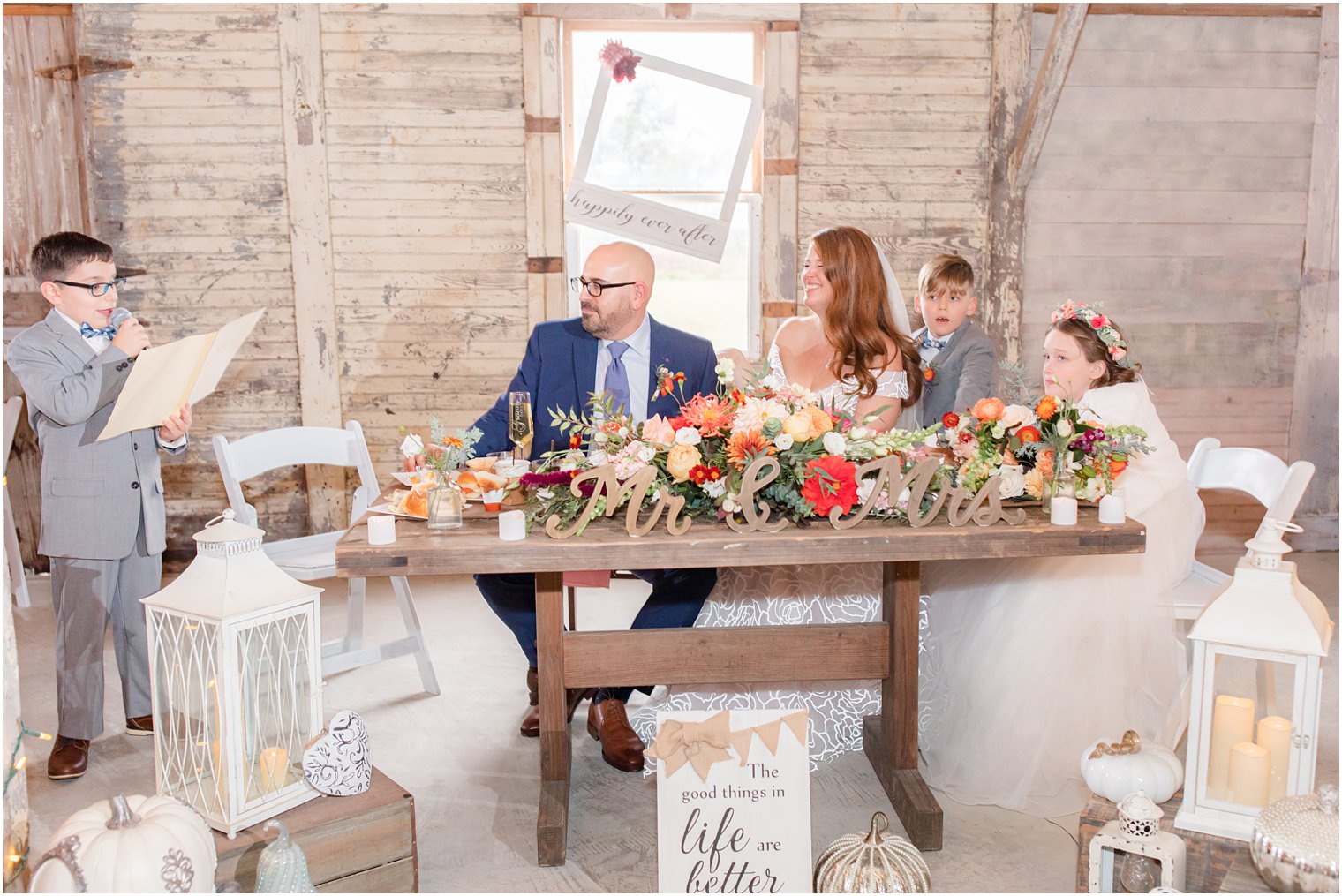 bride and groom listen to son giving speech during NJ wedding