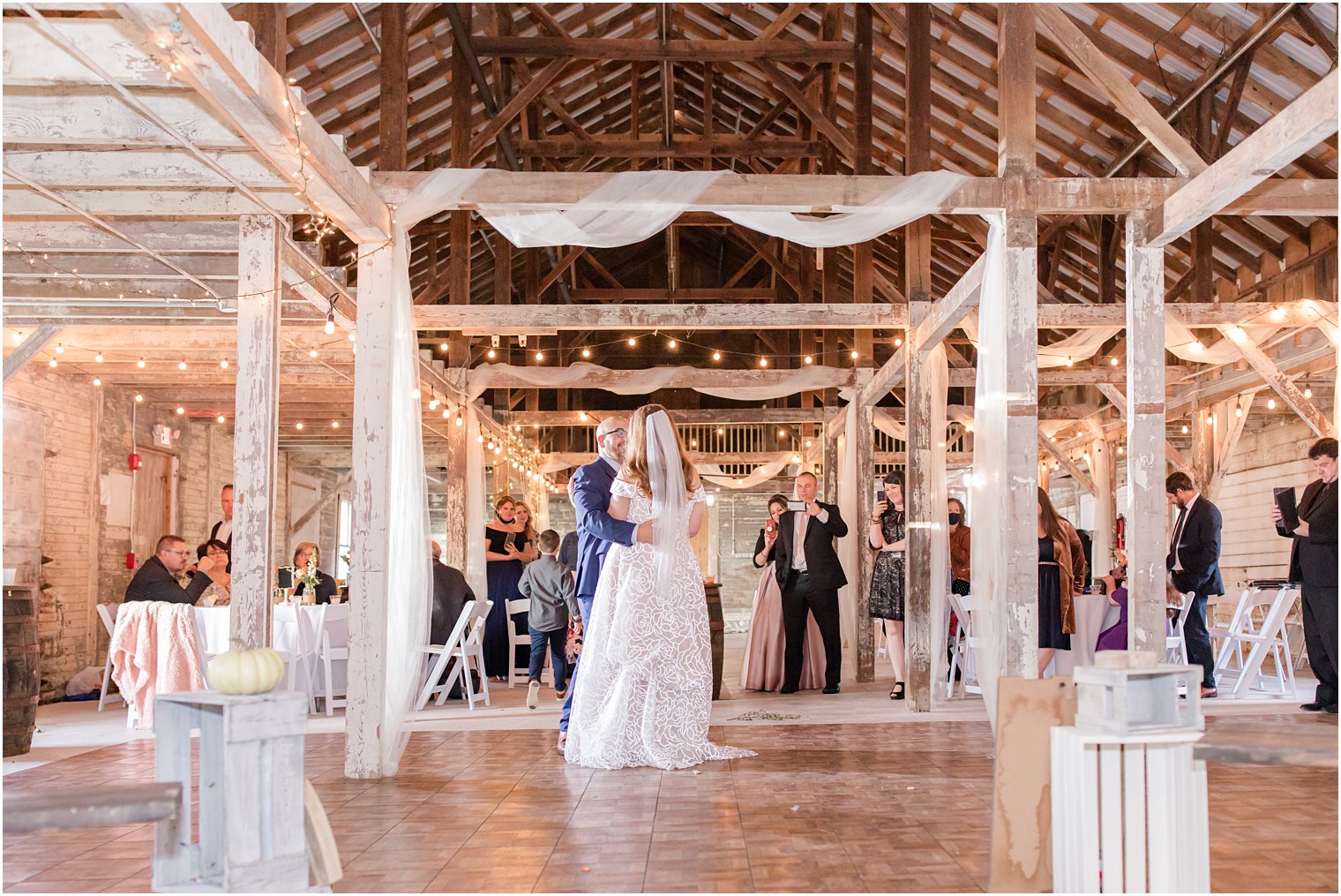 newlyweds dance together during Eagle Manor wedding reception