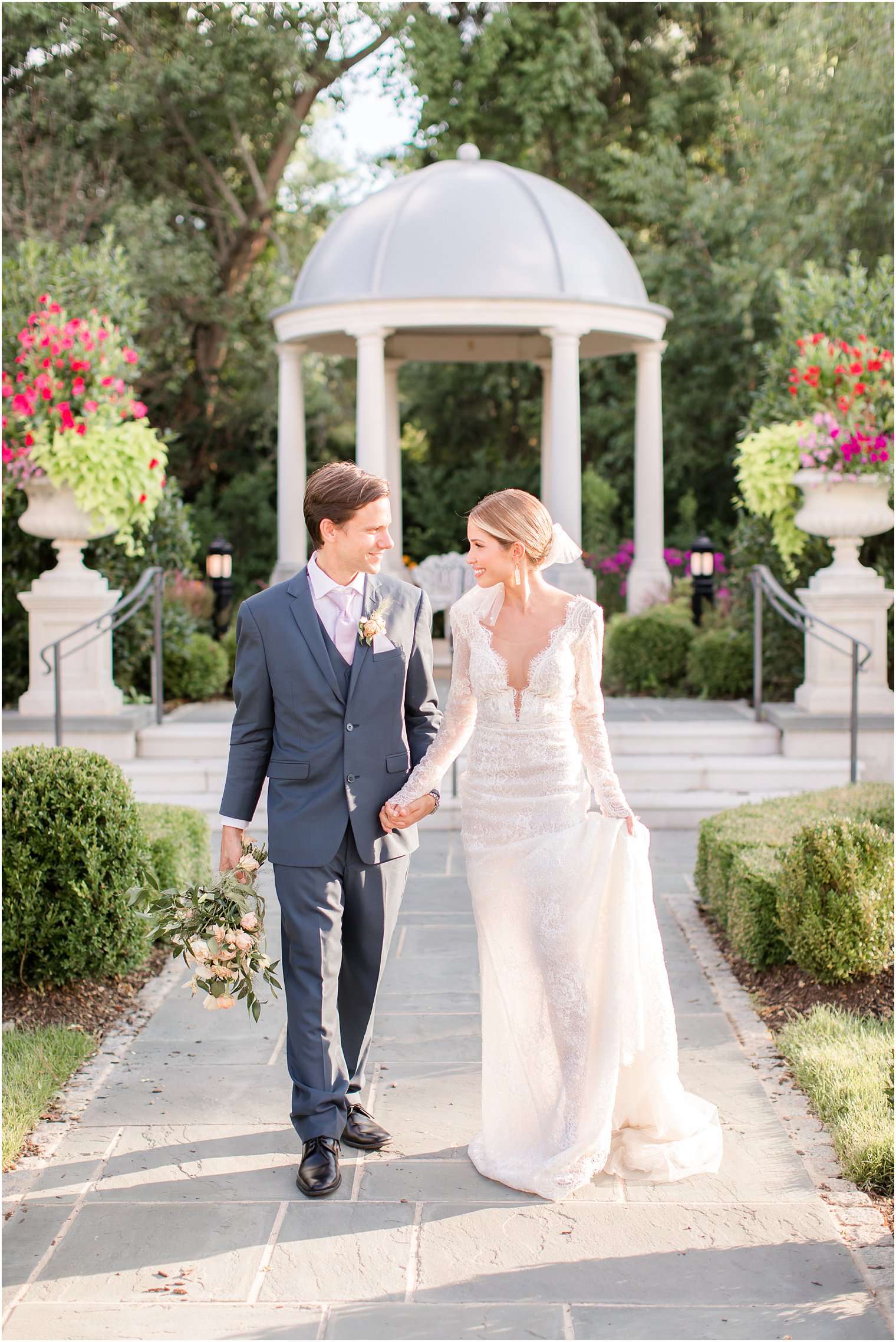 Couple walking in the gardens of Park Chateau Estate and Gardens in East Brunswick, NJ