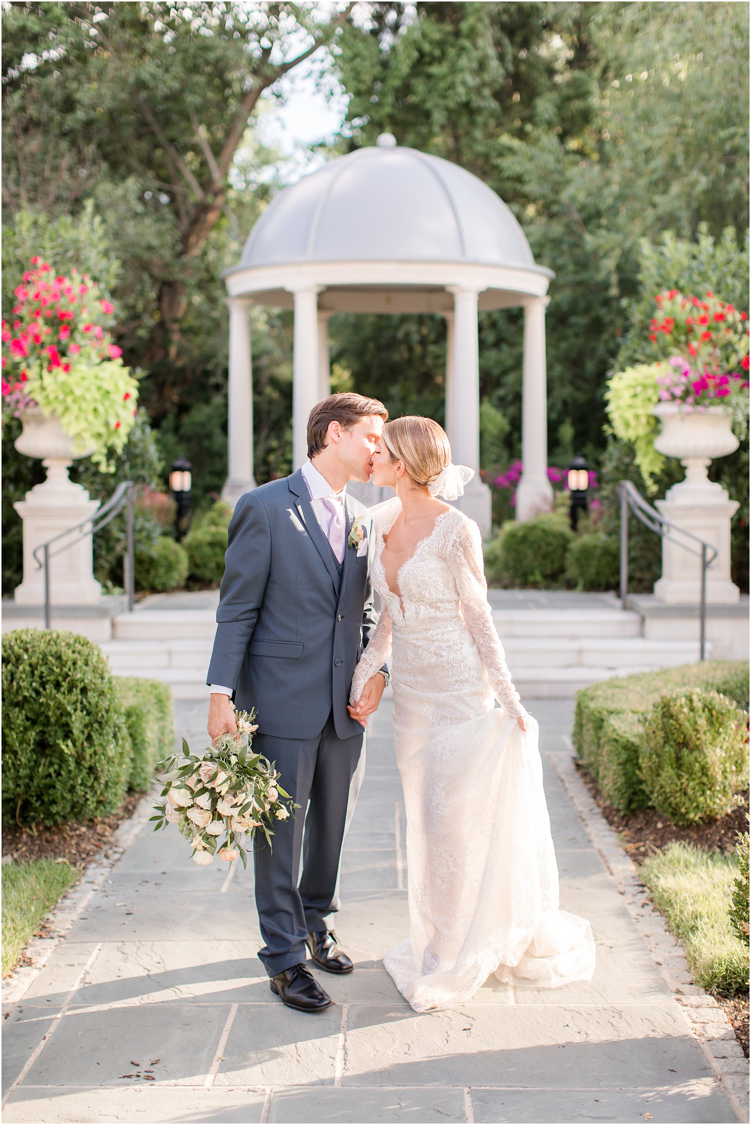 Bride and groom kissing at Park Chateau Estate and Gardens in East Brunswick, NJ