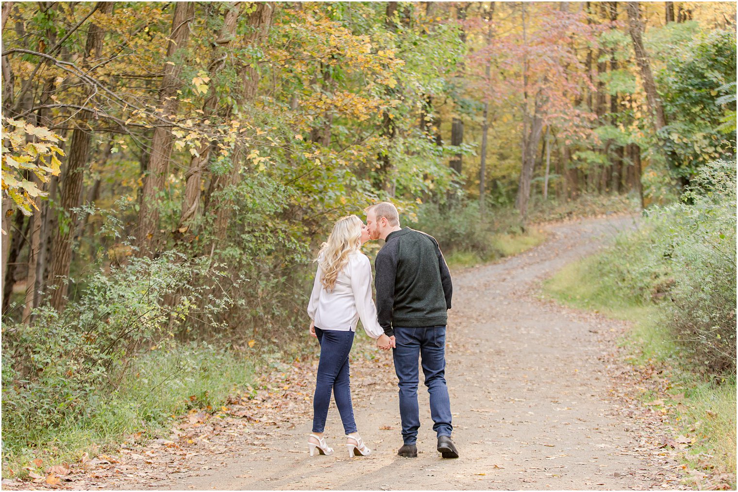 engaged couple kisses during NJ Fall Engagement Session
