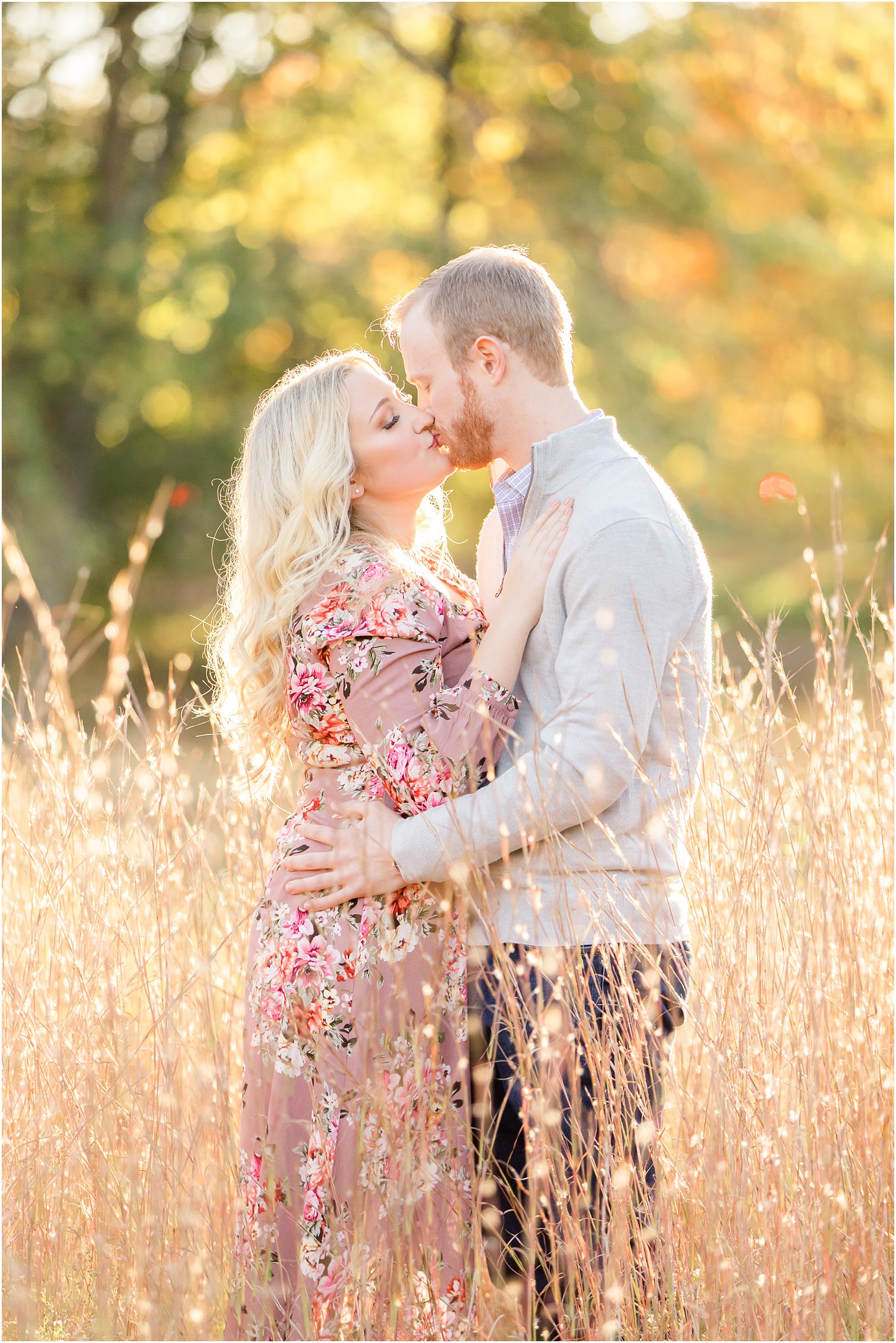 engaged couple kisses during sunset Ramapo Reservation portraits