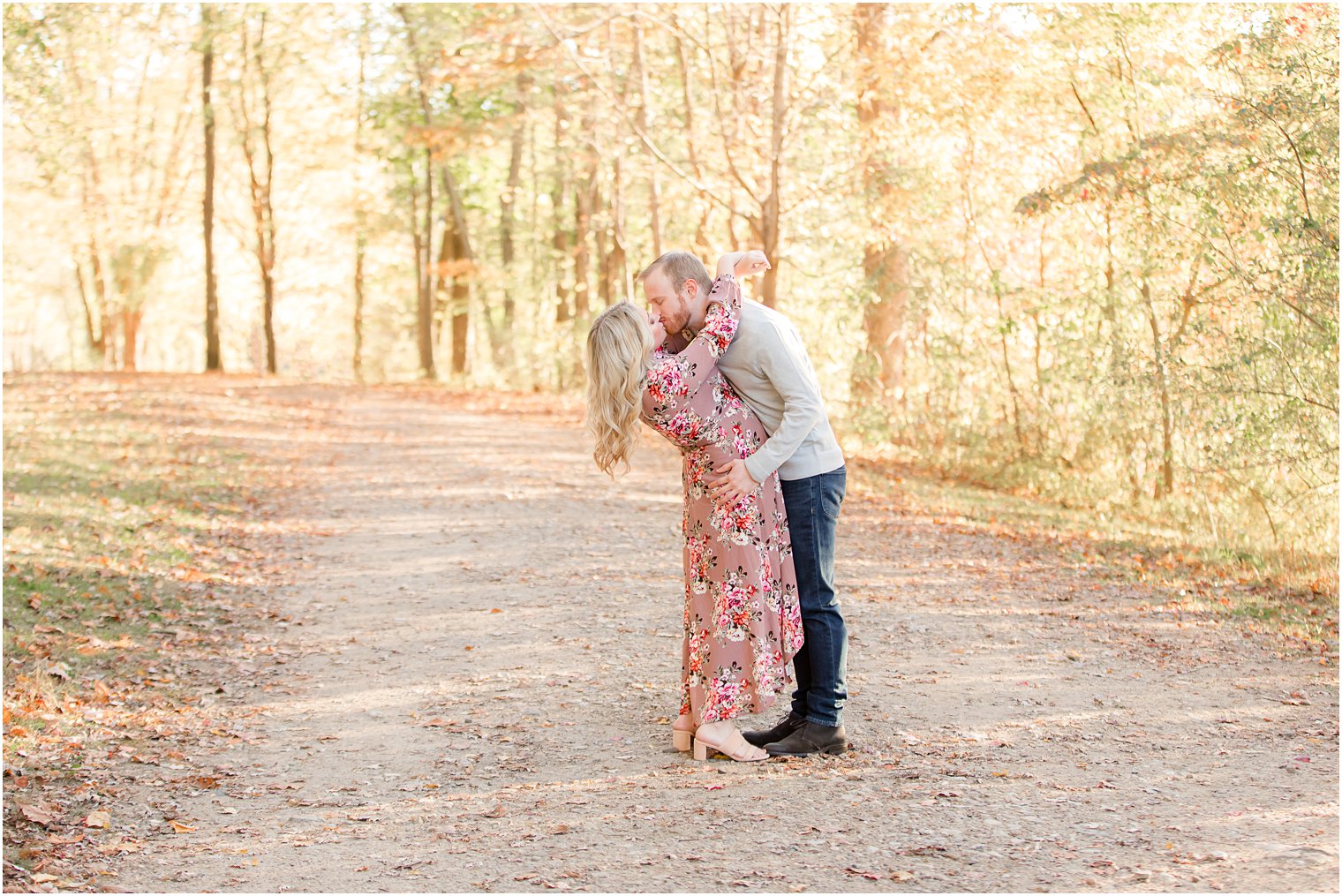 engaged couple kisses during Fall NJ engagement photos