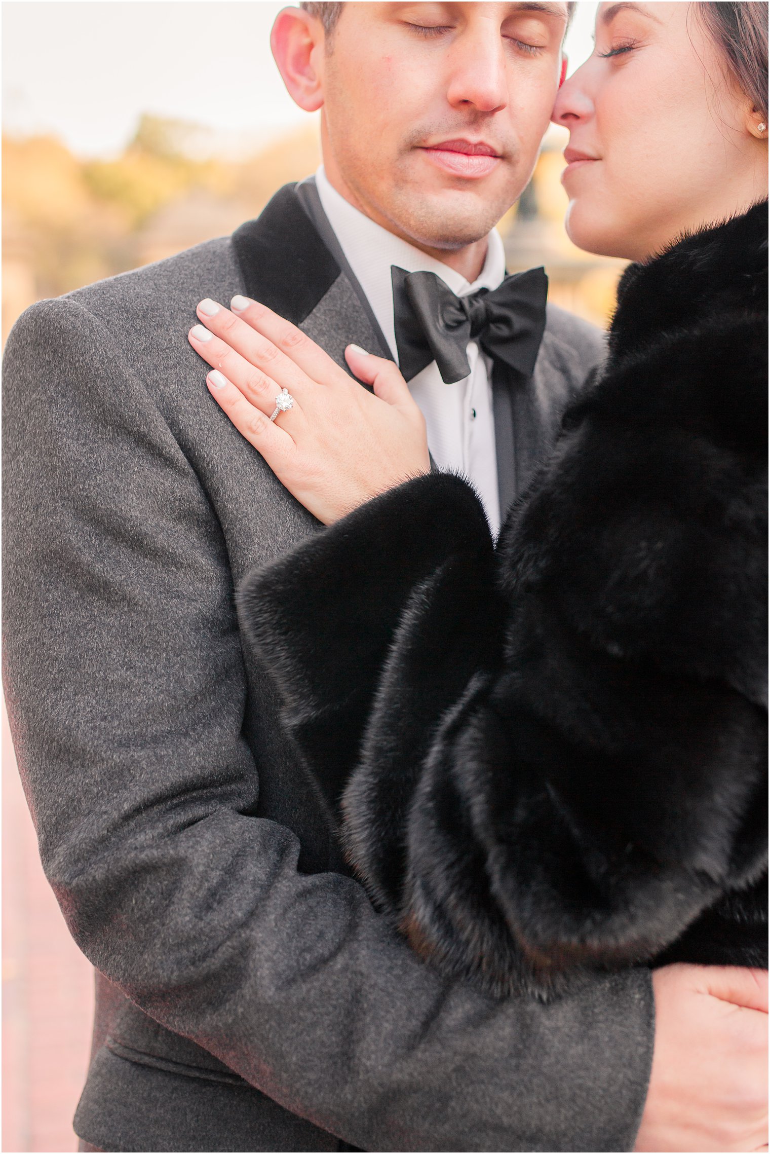 Engaged couple on a cold winter day at Bethesda Terrace in Central Park, NYC