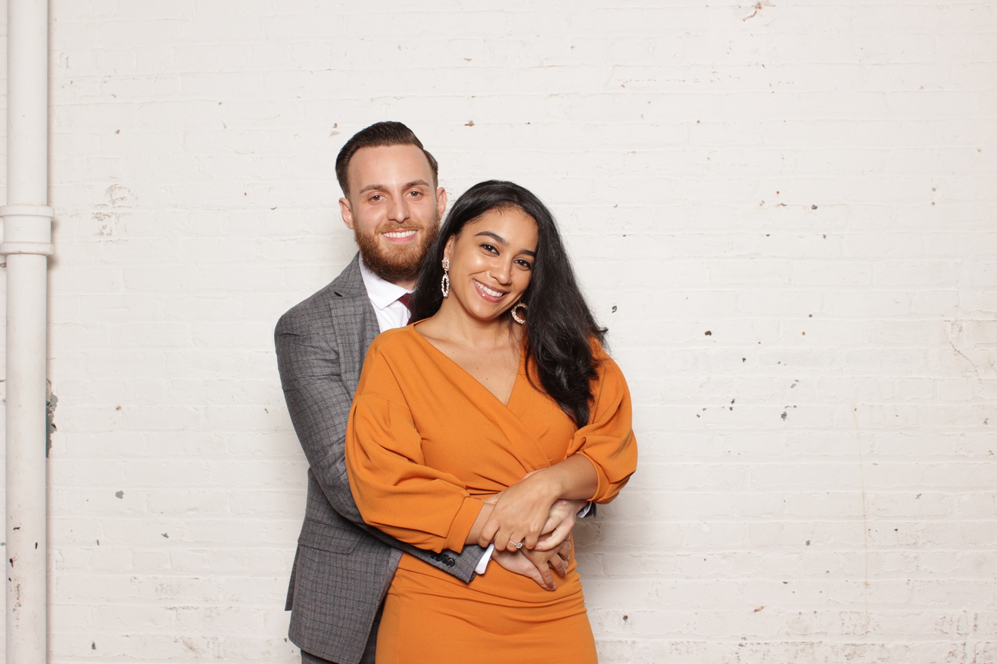 couple poses together during NJ photo booth