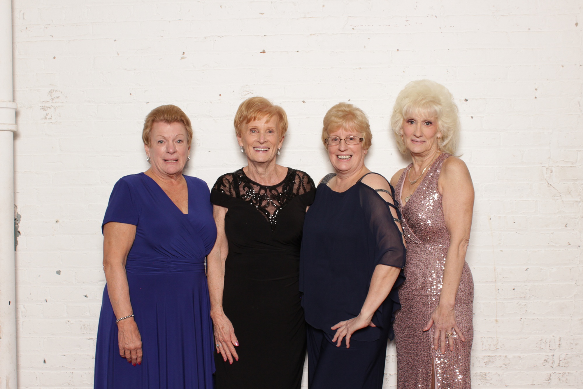 older women pose together during NJ photo booth fun