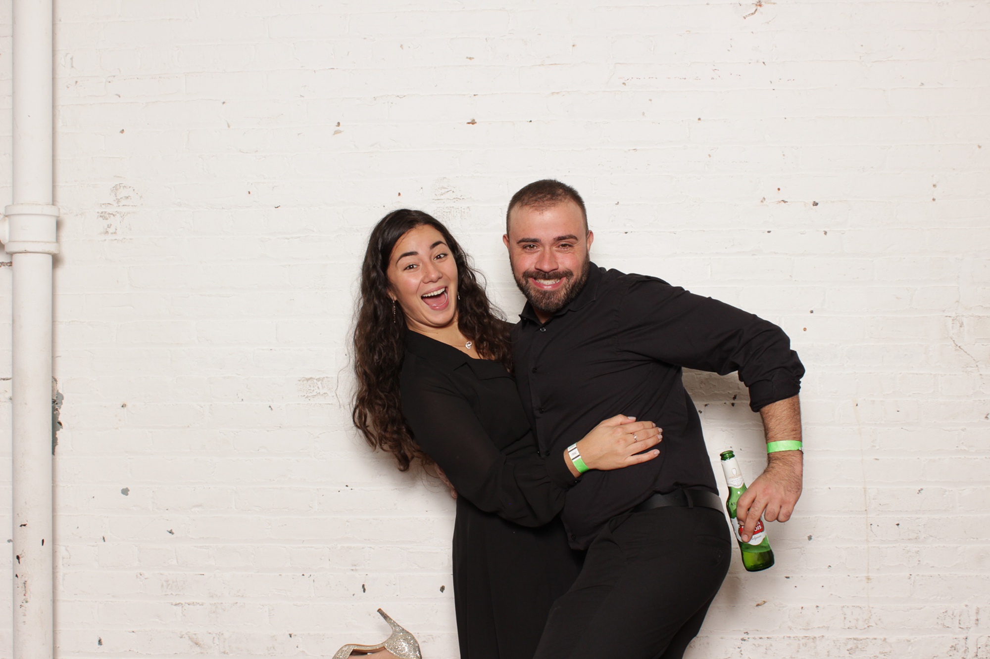 guest poses with date in Art Factory Studios Photo Booth