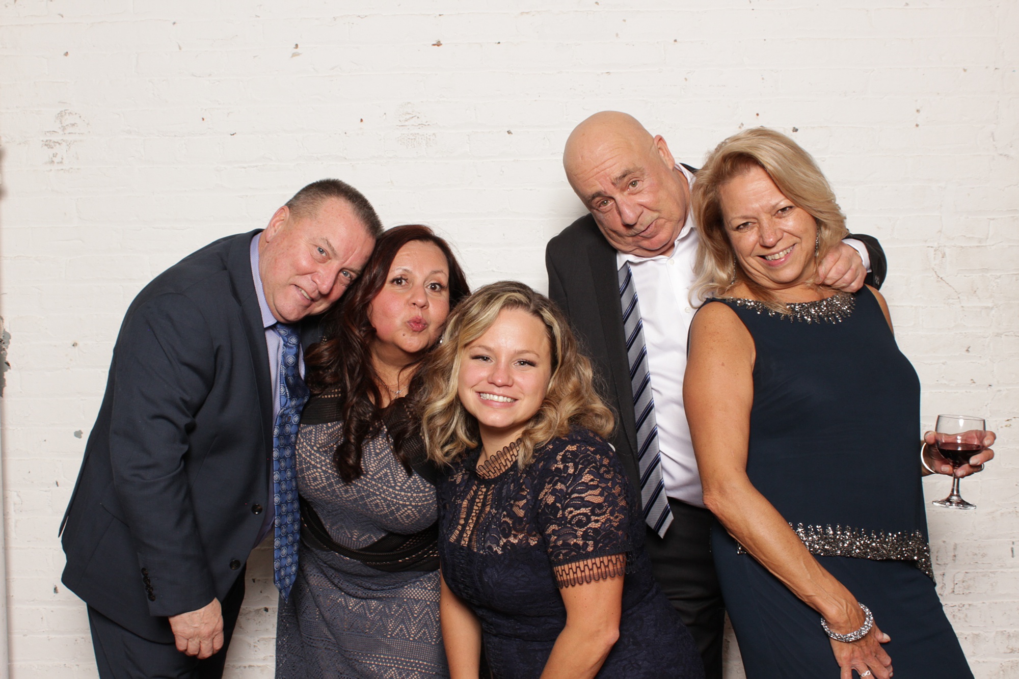 family laughs during photo booth in NJ