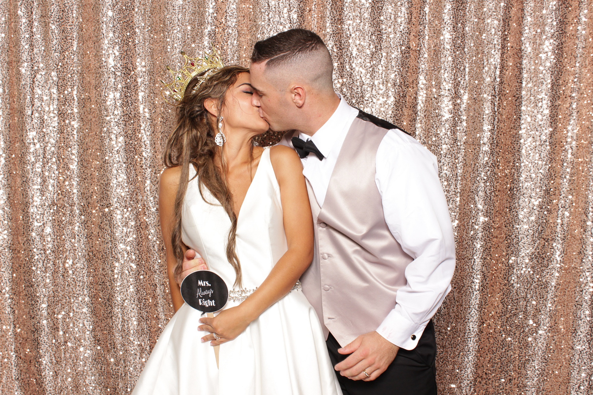 bride and groom kiss during NJ photo booth
