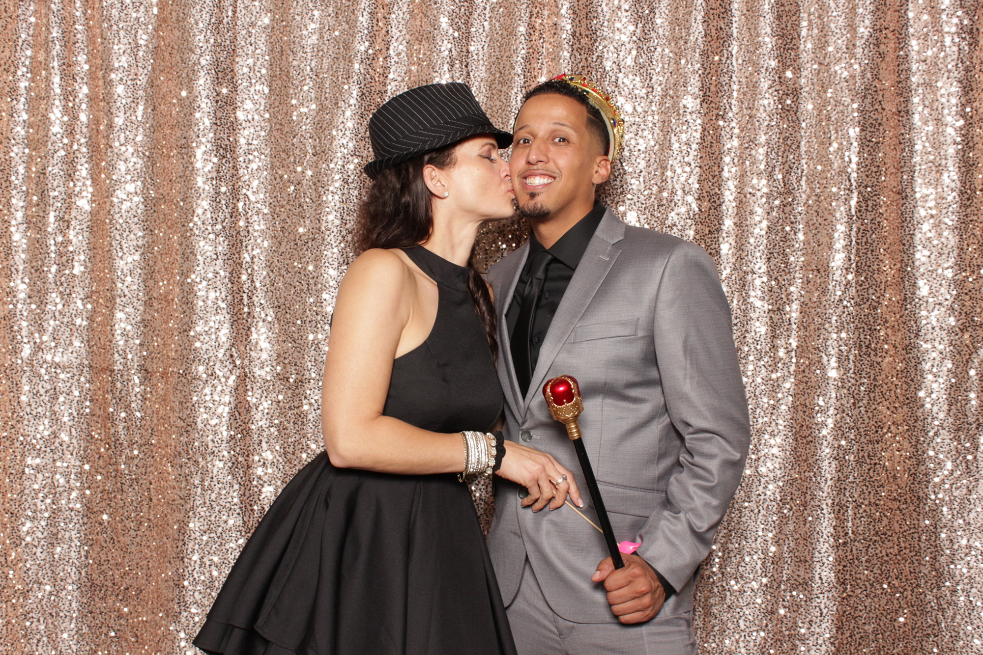 girlfriend kisses boyfriend's cheek during NJ photo booth