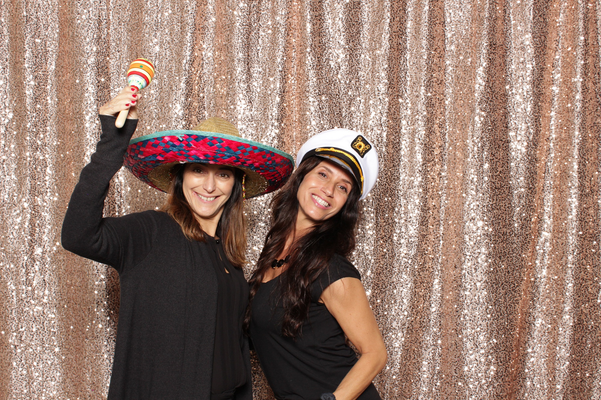 two women pose in Park Chateau Estate Photo Booth