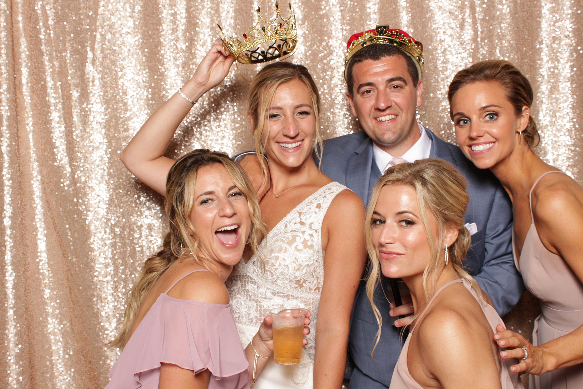 bride and groom pose with bridal party in Sandy Hook Chapel Photo Booth