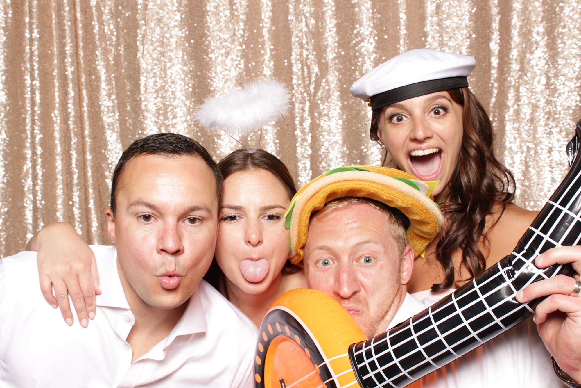guests play with inflatable banjo during Sandy Hook Chapel Photo Booth