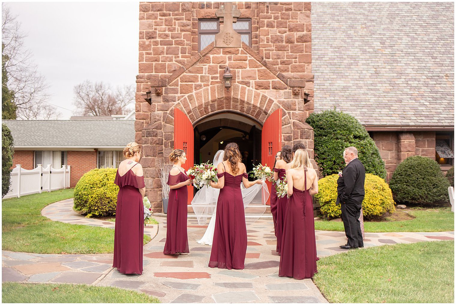 bridesmaids walk into Grace Episcopal Church in Nutley