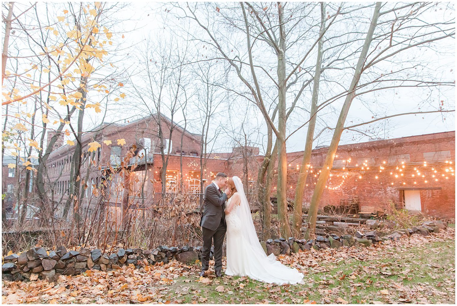 Art Factory Studios wedding portraits with fairy lights in background