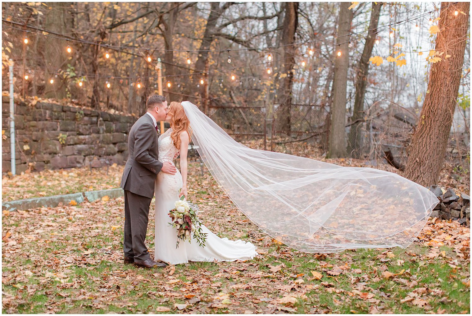 bride's veil floats during New Jersey wedding portraits at Art Factory Studios