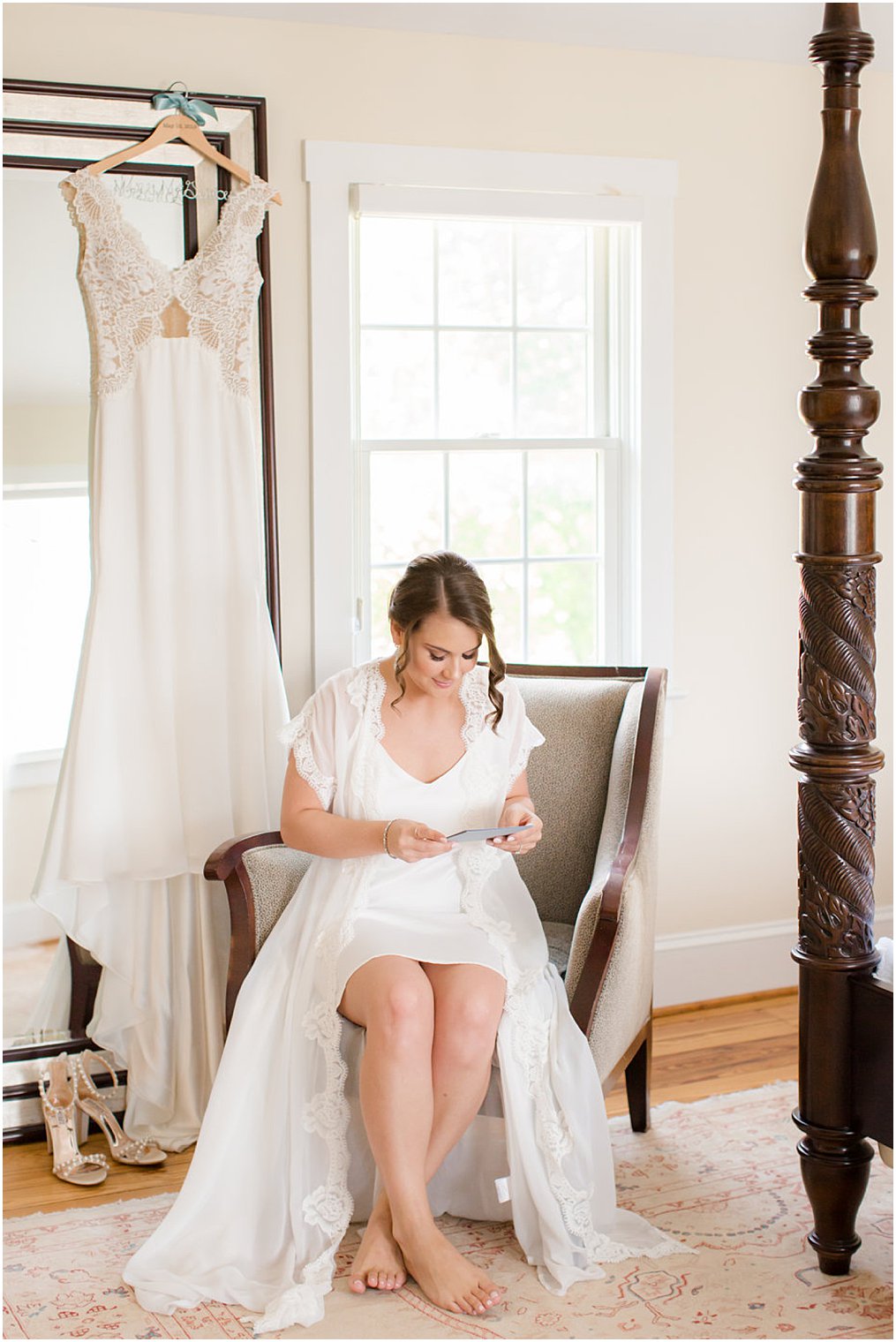 bride reading letter from her groom at Stone Tower Winery 