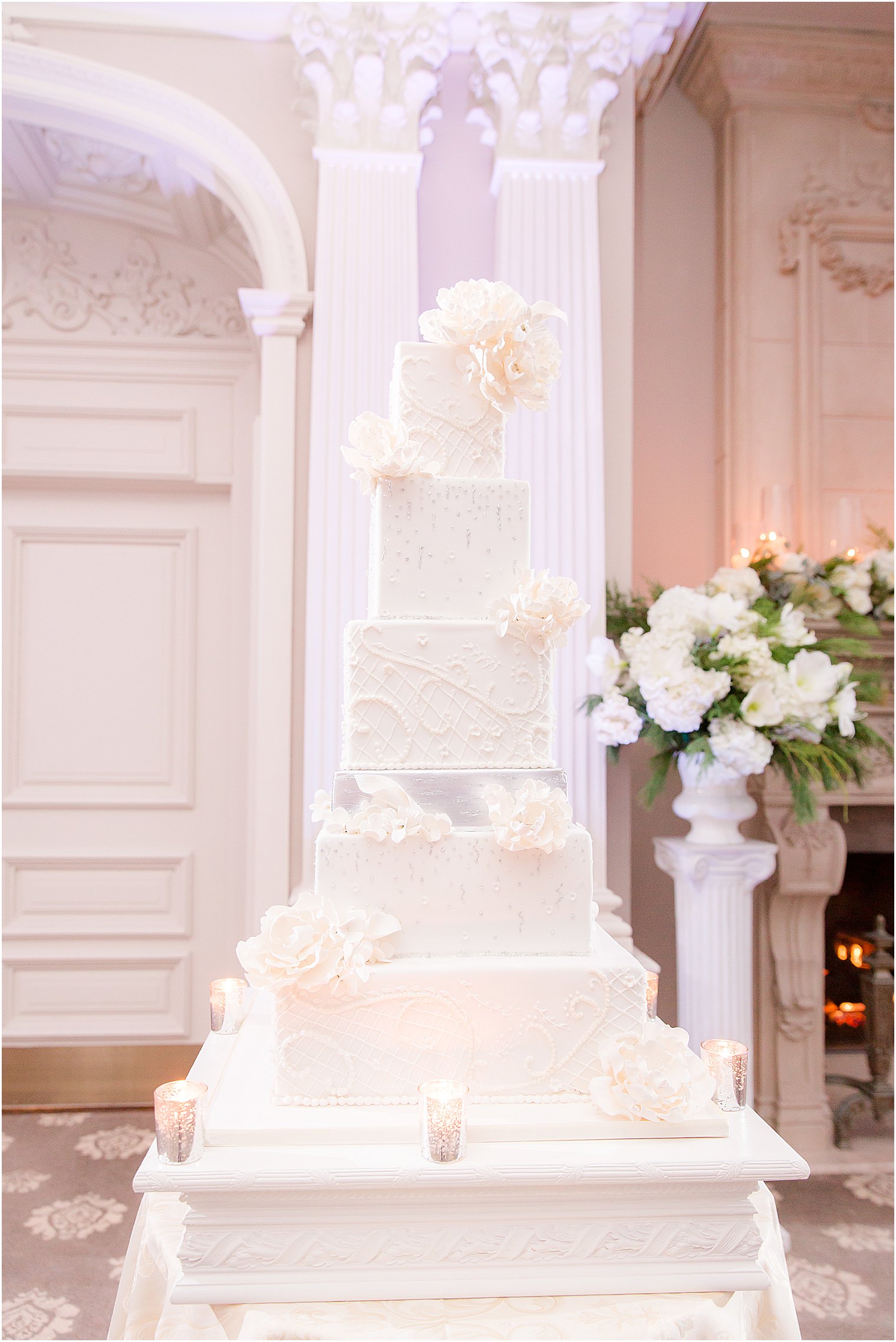 elegant wedding cake with intricate sugar work from My Daughter's Cakes