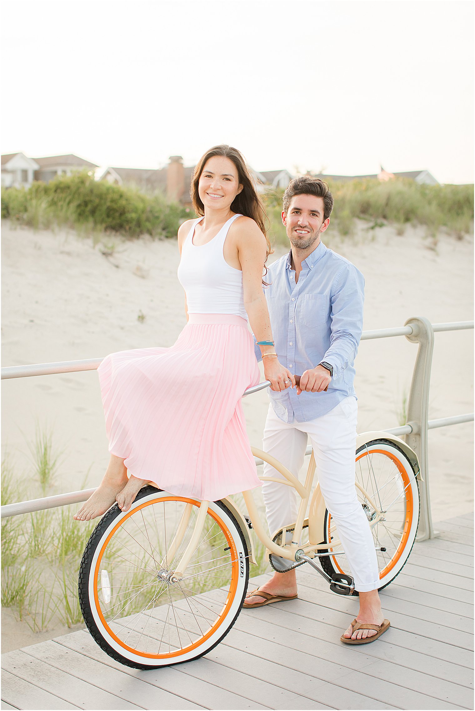 couple sits on bike during NJ engagement session