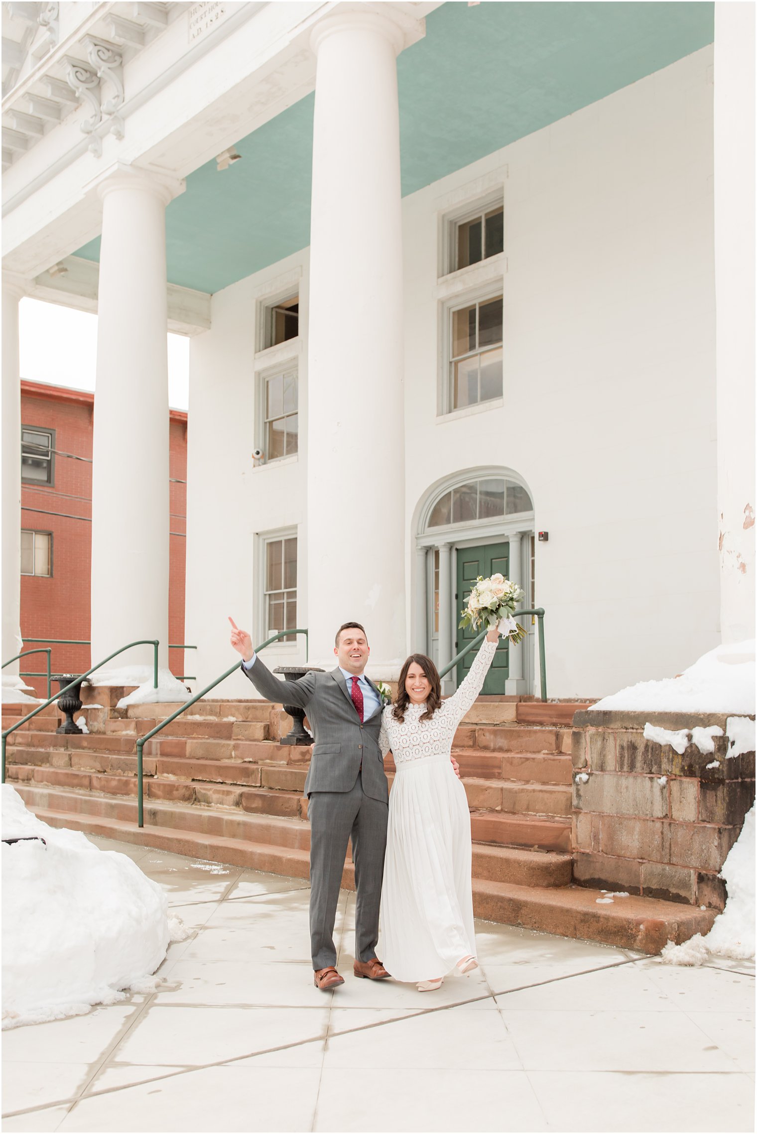 newlyweds cheer after elopement at NJ Courthouse 