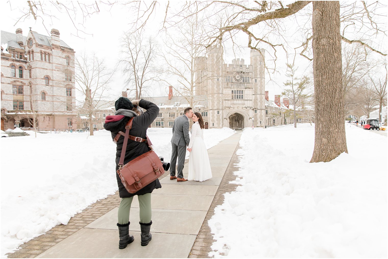 Idalia Photography captures bride and groom walking on sidewalk at Princeton University 