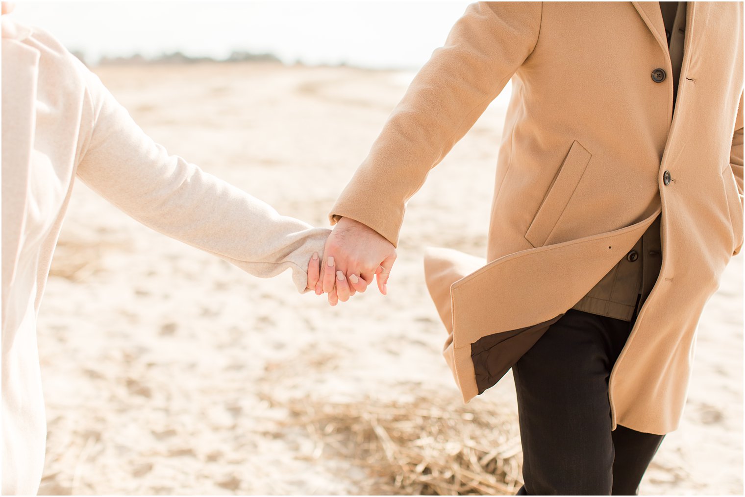 Close-up of engaged couples' hands