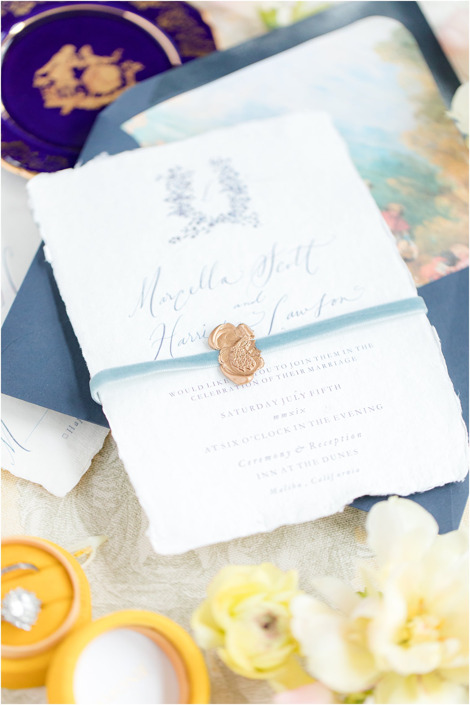 Wax seal used as belly band for wedding invitation 