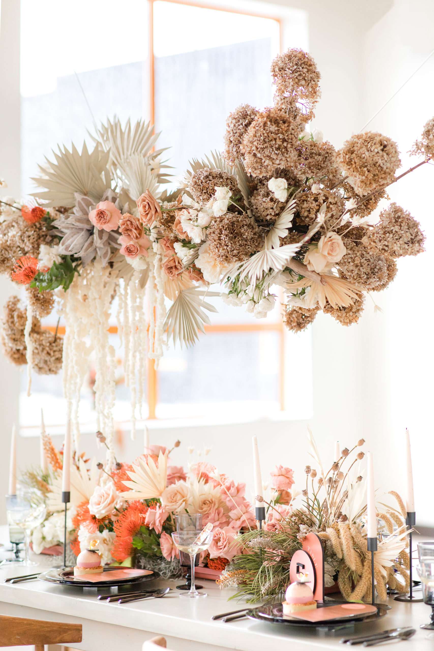 hanging reception florals above table at Ironworks at Pencoyd Landing