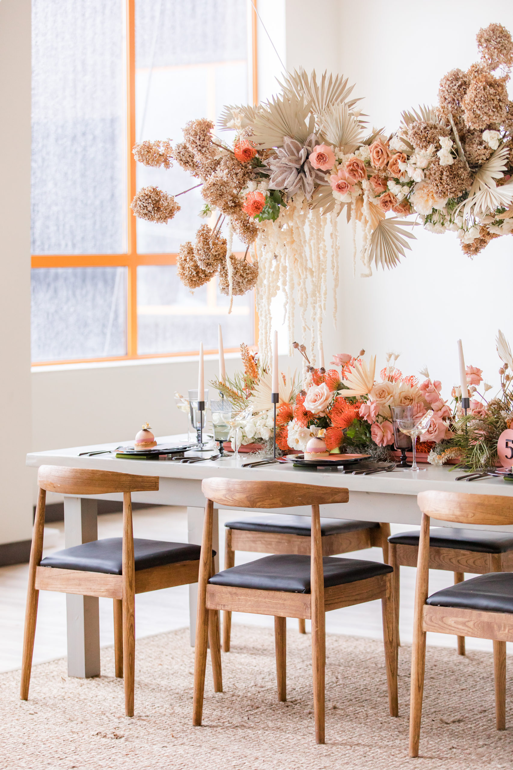 tables cape for Ironworks at Pencoyd Landing wedding reception with hanging floral display