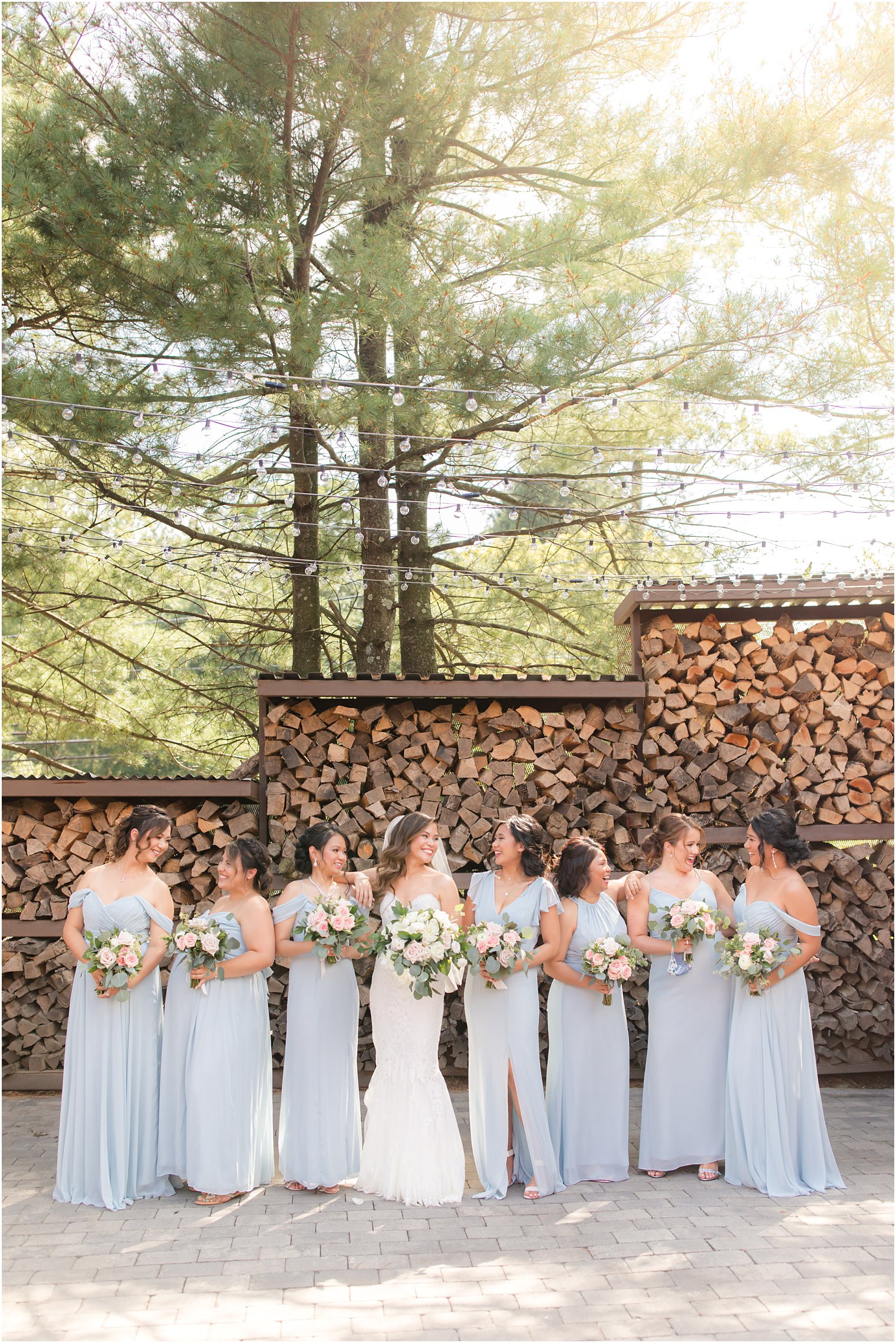 bridesmaids in blue gowns demonstrate trendy wedding colors