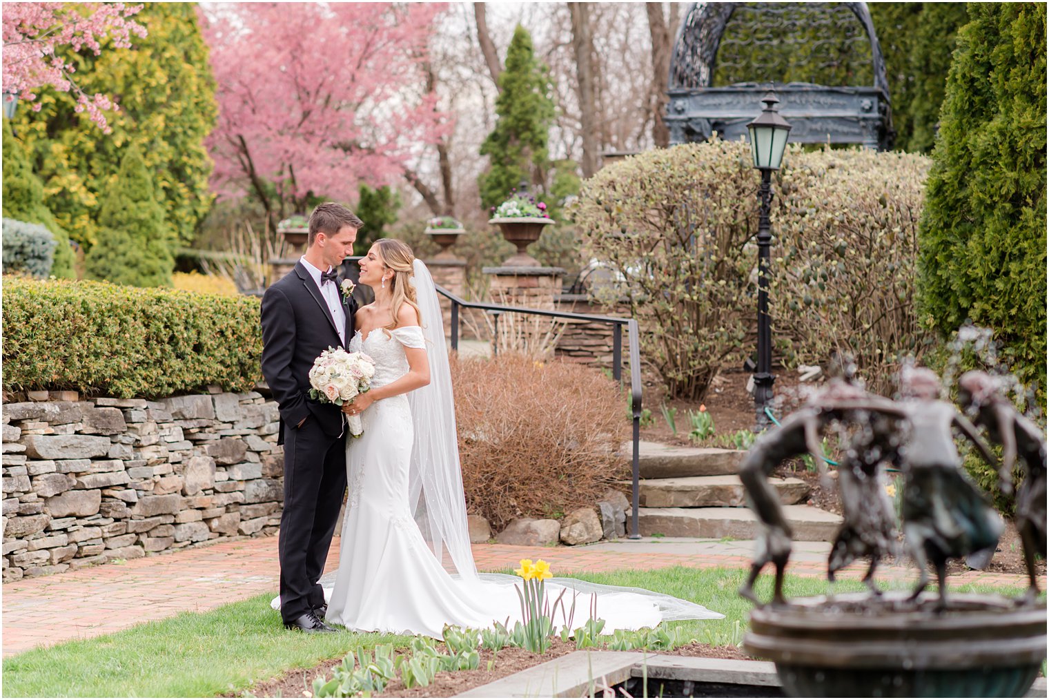 bride and groom pose in Park Savoy Estate wedding photos 