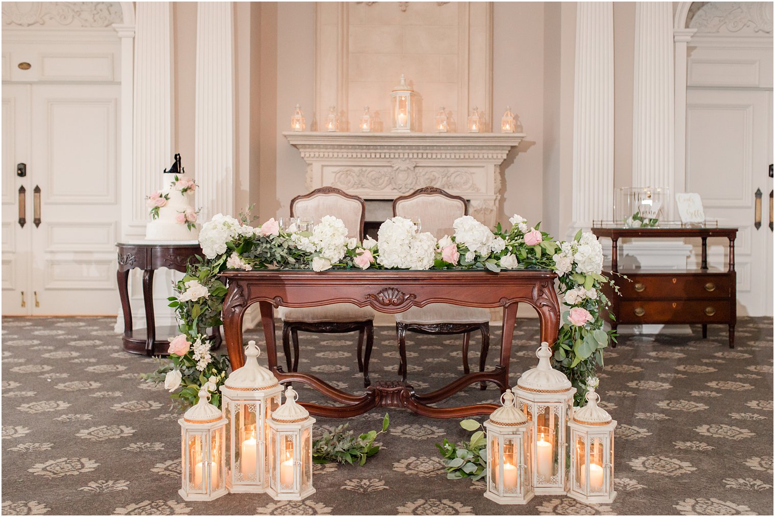 sweetheart table for Spring Park Savoy Estate wedding with floral garland 