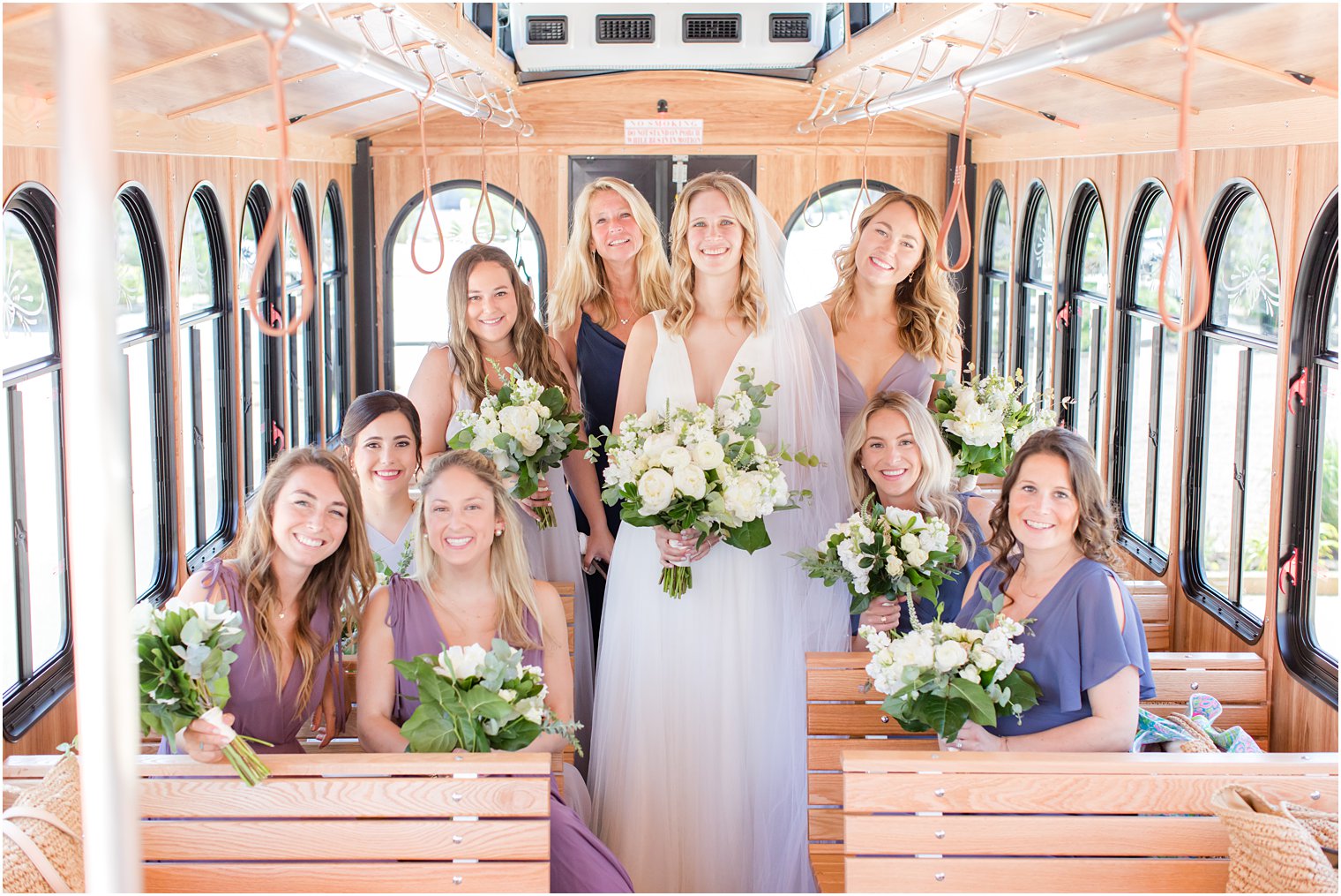 bride and bridesmaids ride trolley in Bay Head NJ
