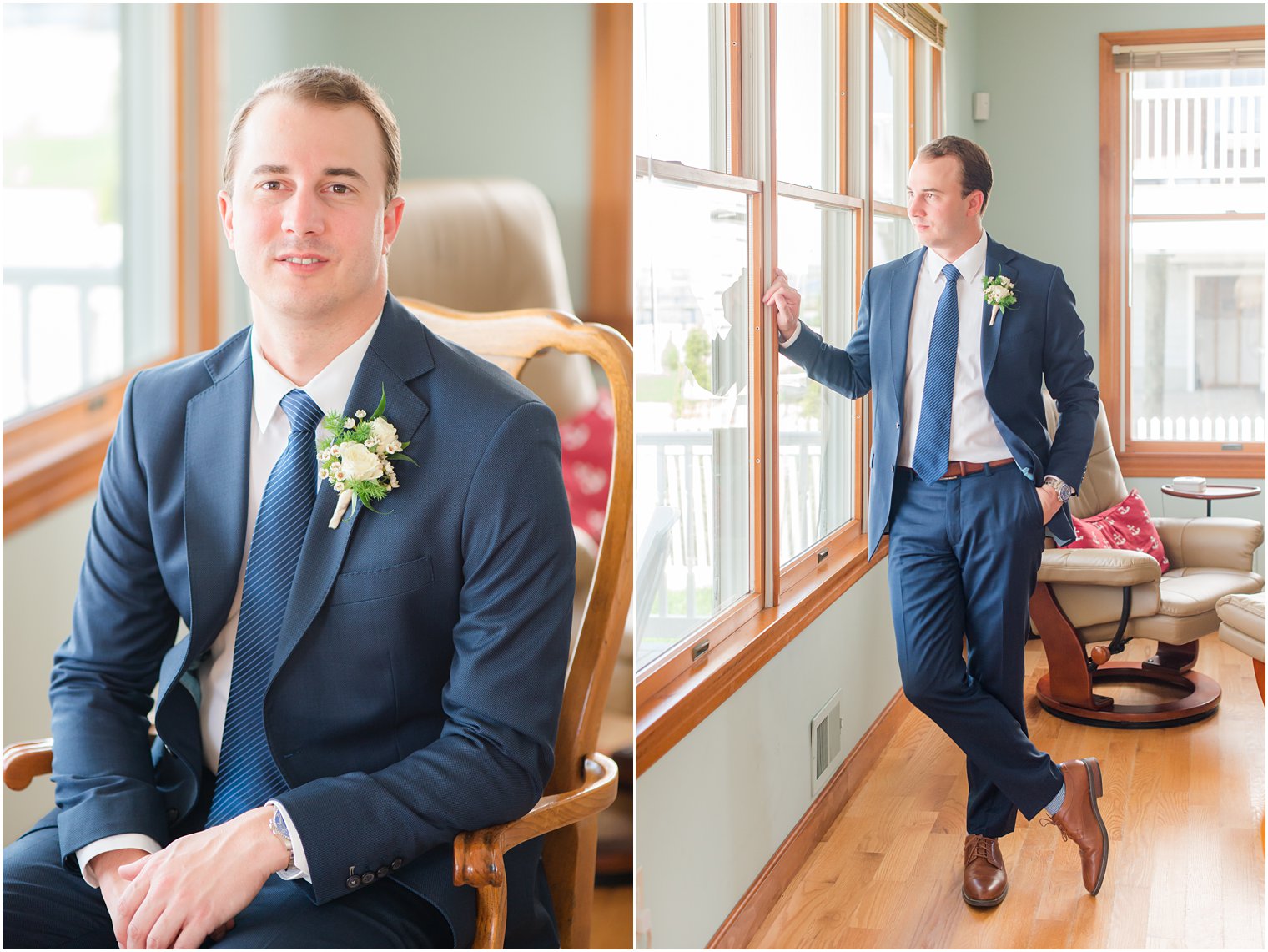 groom looks out window in navy suit before NJ wedding 