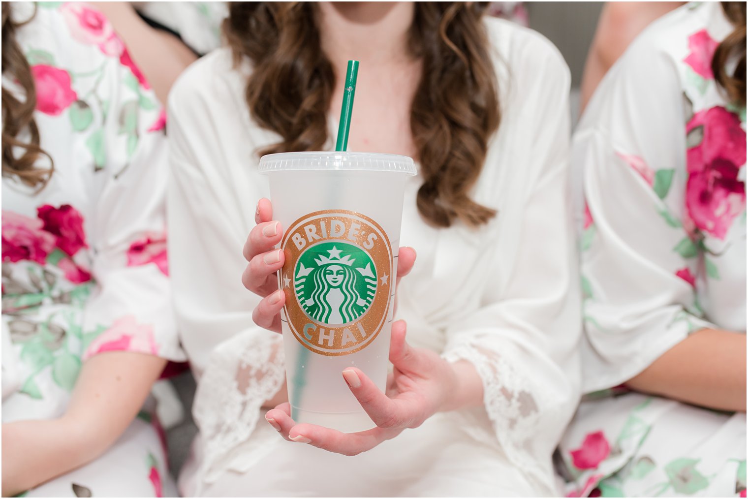 bride holds custom Starbucks cup while preparing for NJ wedding day