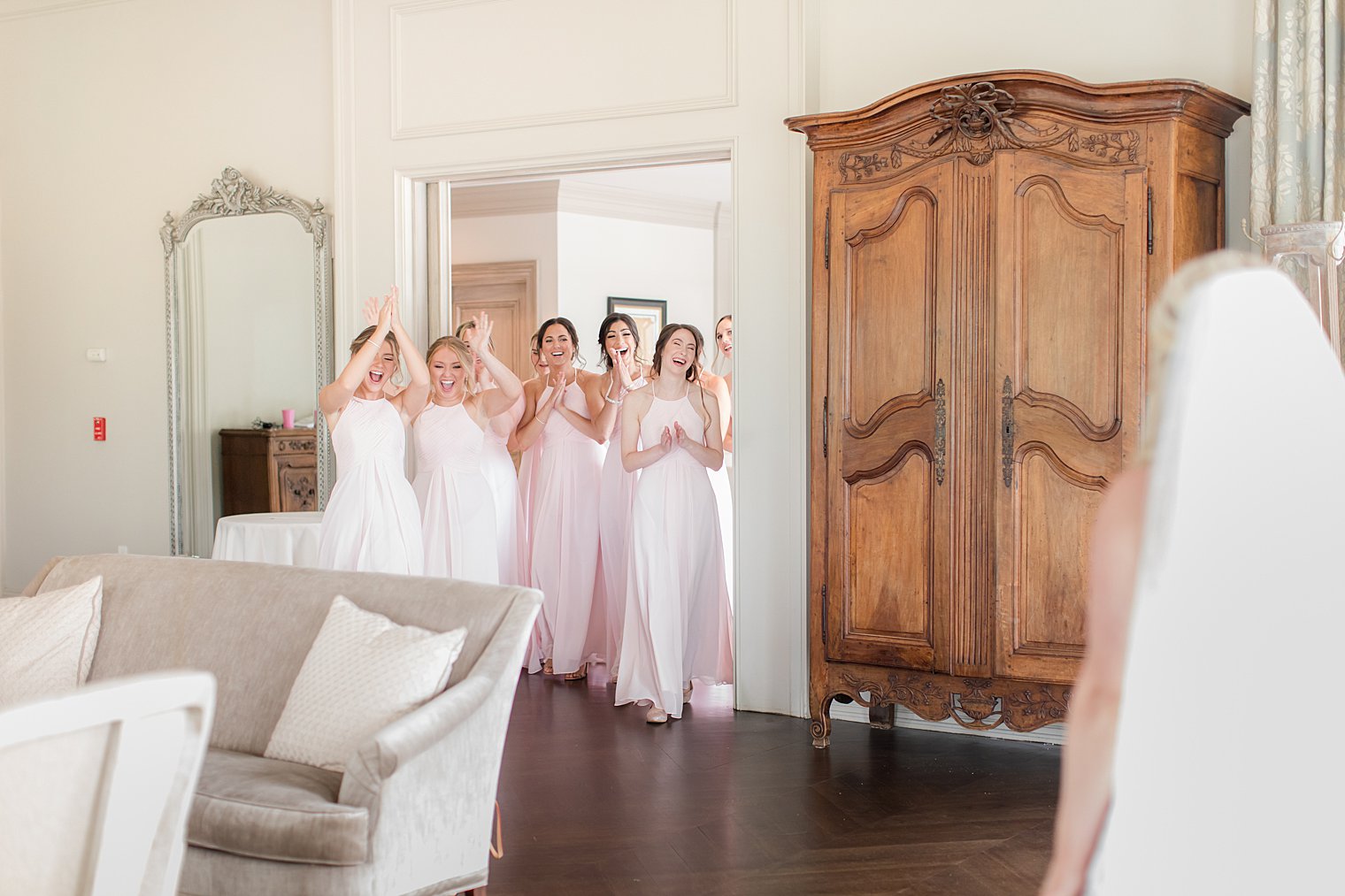 bridesmaids have first look with bride in suite at Park Chateau Estate