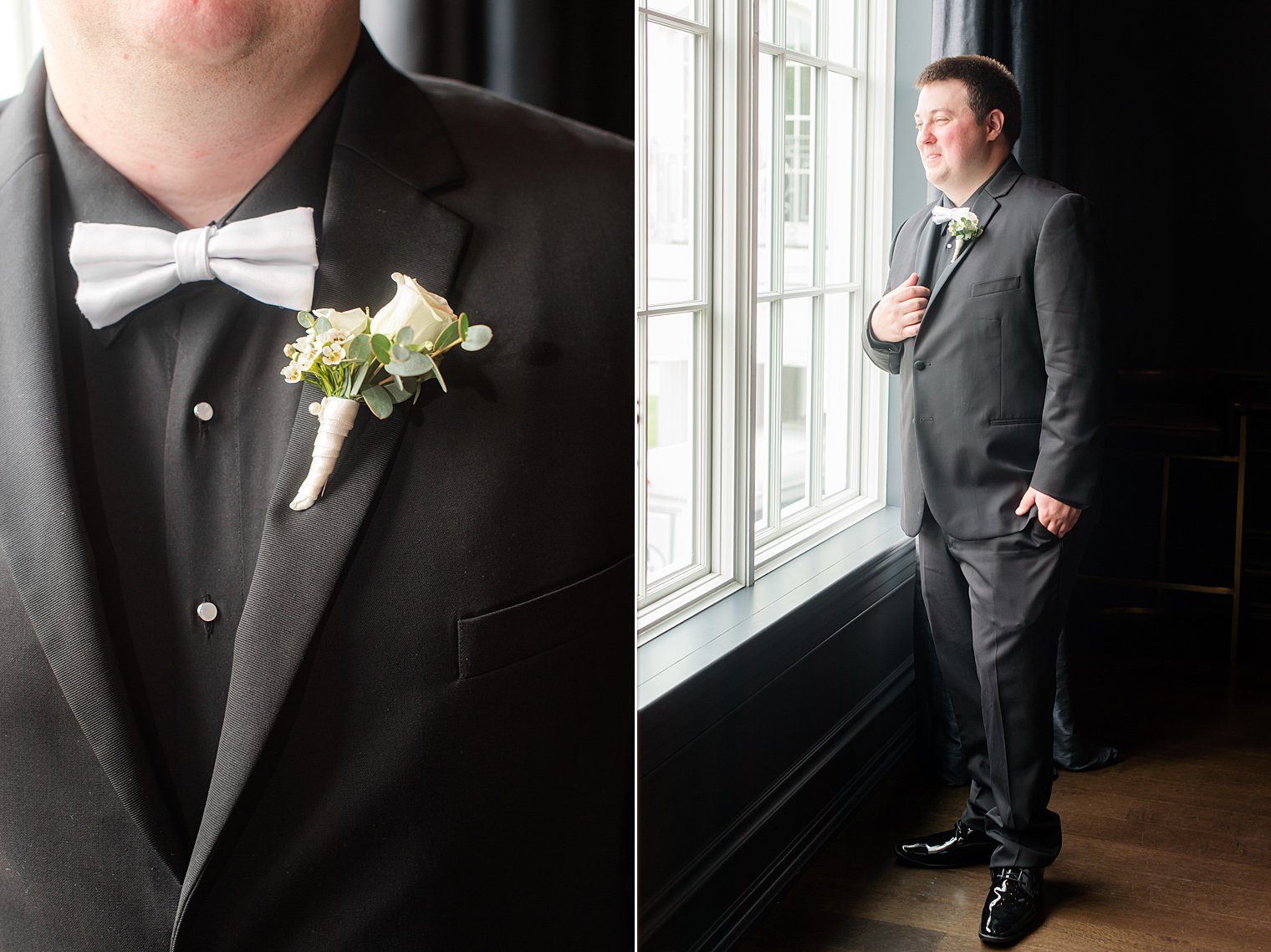 groom looks out window in black suit with white tie before NJ wedding