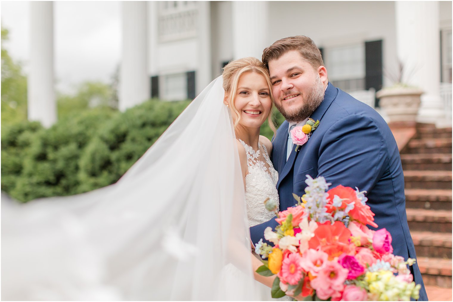 bride and groom hug with heads touching during Rosemont Manor wedding day