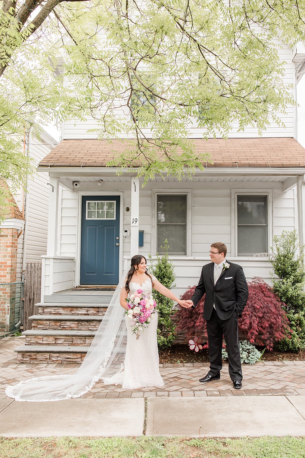 Staten Island wedding portraits of bride and groom outside home