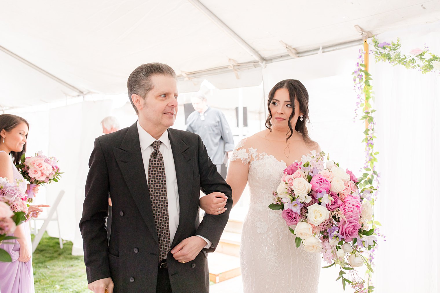 bride walks down aisle with dad during Staten Island wedding at home 