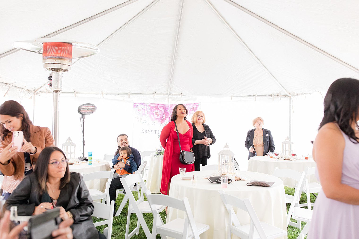 guests watch wedding ceremony under tent in Staten Island NY 