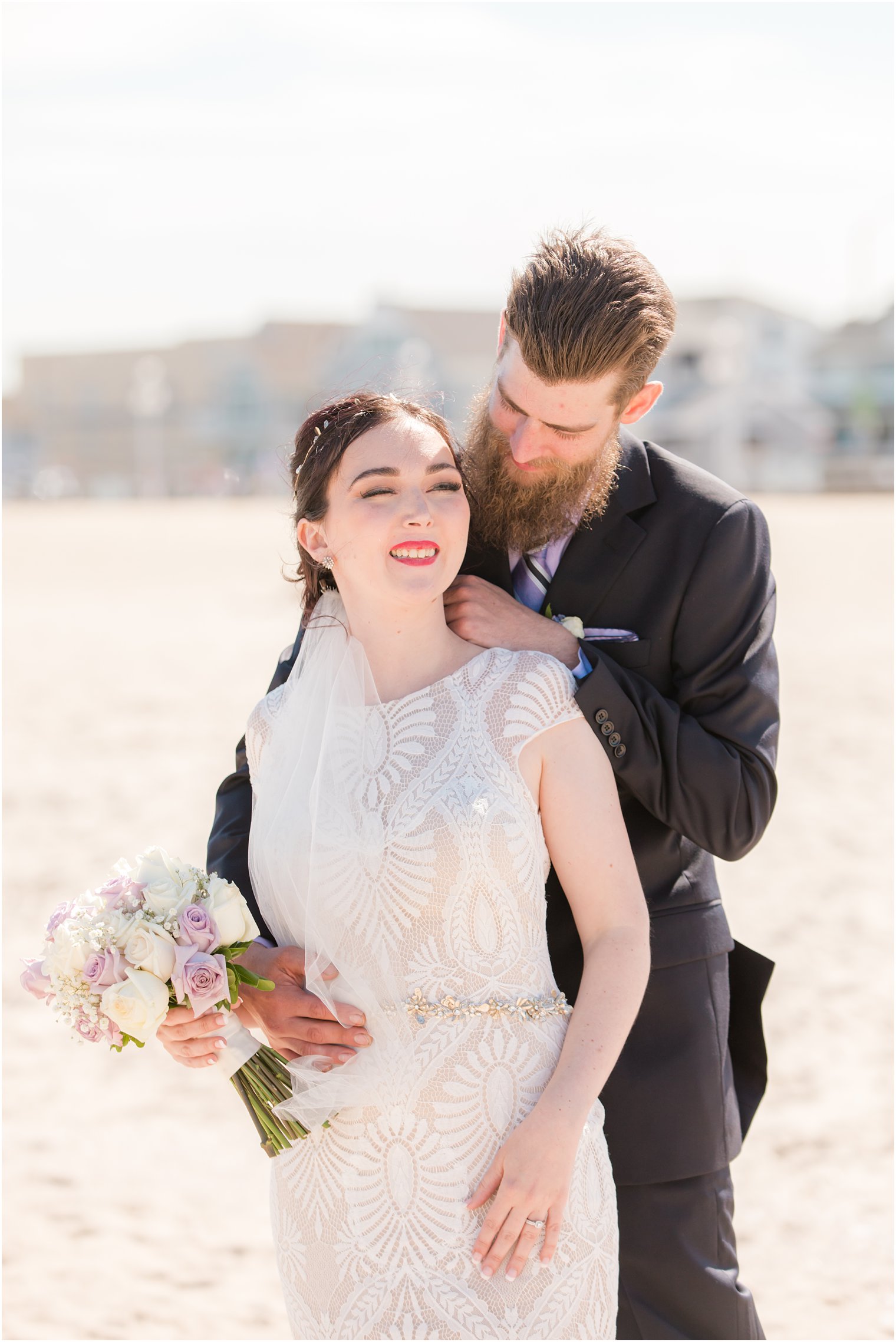 groom looks down at bride during New Jersey wedding photos 