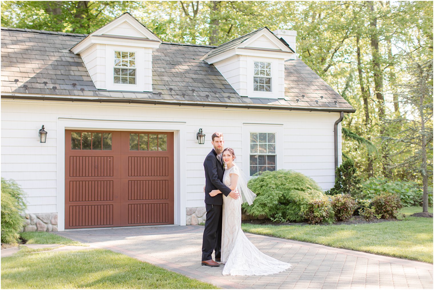 The English Manor wedding portraits of bride and groom on brick walkway